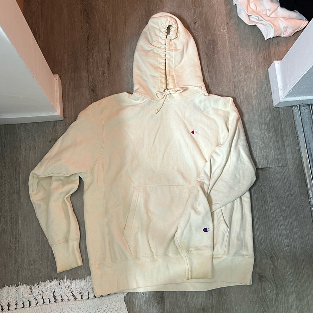 Champion reverse weave cream hoodie in size large.